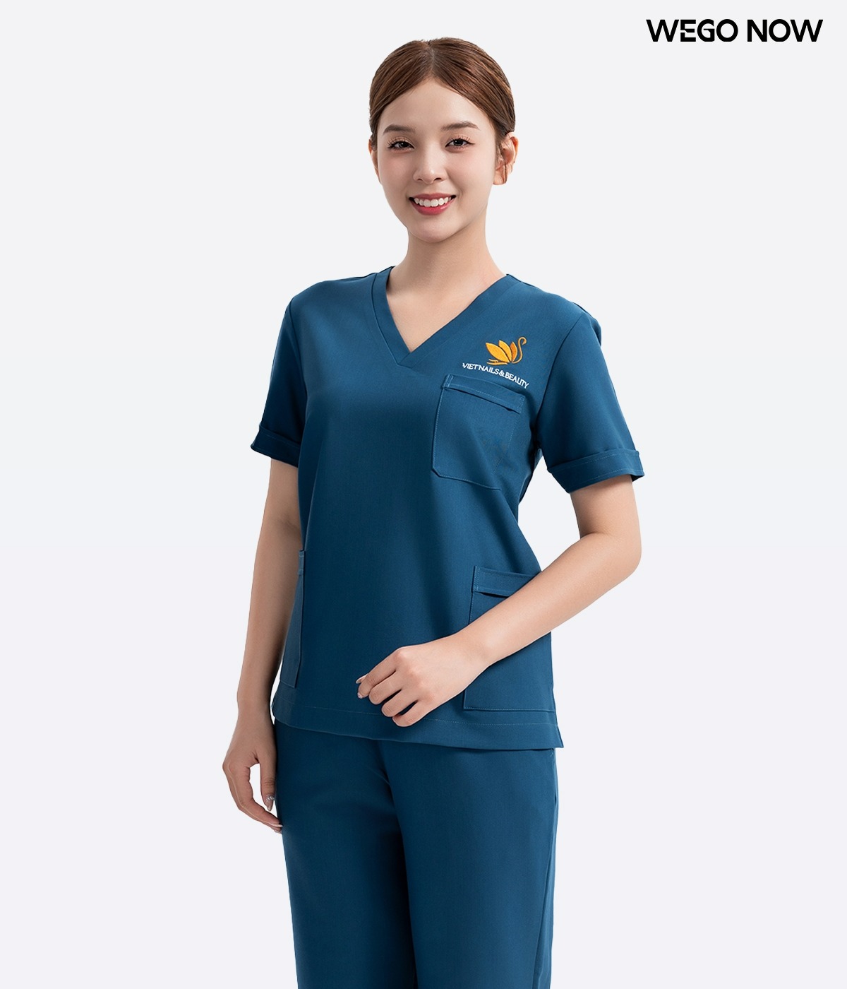 Đồng phục spa Màu lông công cổ V 01